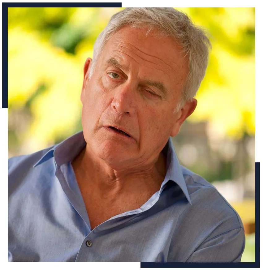 Older man speaking with effort