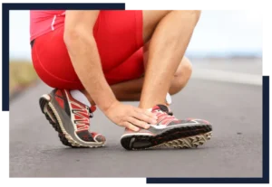 Runner holding the bottom of his foot